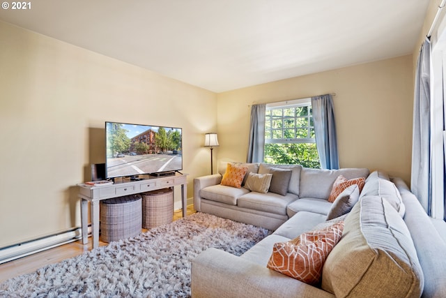 living room with light hardwood / wood-style flooring