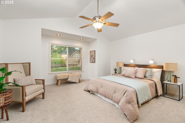 bedroom featuring baseboards, light carpet, ceiling fan, and vaulted ceiling