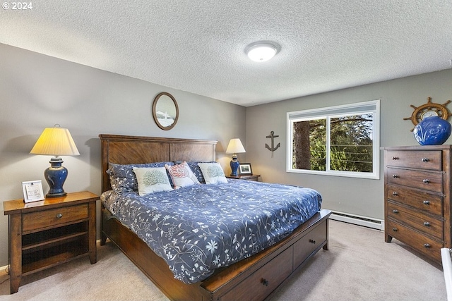 bedroom with light colored carpet, a textured ceiling, and baseboard heating