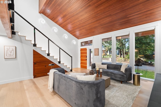 living room with high vaulted ceiling, wooden ceiling, and light wood-type flooring