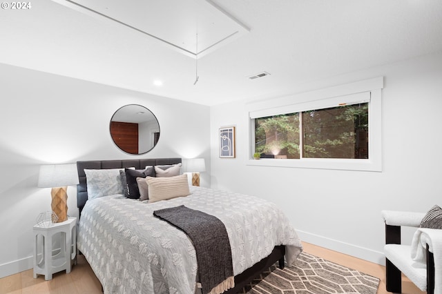 bedroom featuring wood-type flooring