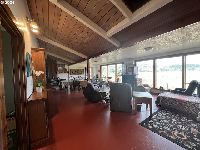 living area with wooden ceiling and vaulted ceiling with beams