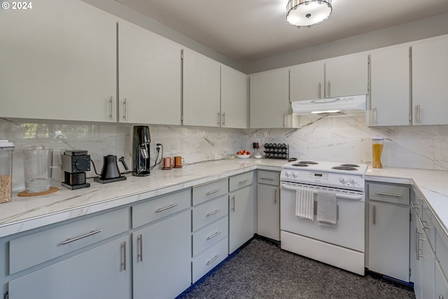 kitchen featuring backsplash, electric stove, and white cabinetry