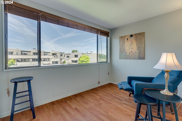 sitting room featuring light hardwood / wood-style flooring