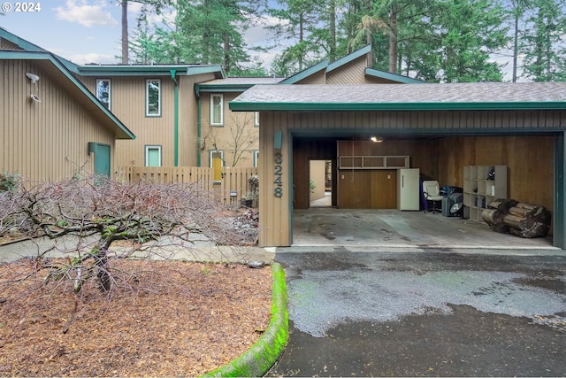 view of front of house featuring a carport