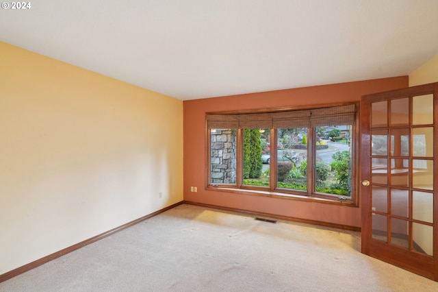 view of carpeted spare room