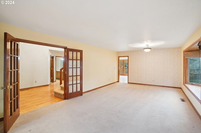 unfurnished room featuring hardwood / wood-style floors