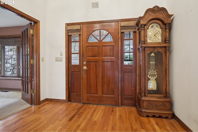 foyer entrance with light hardwood / wood-style flooring