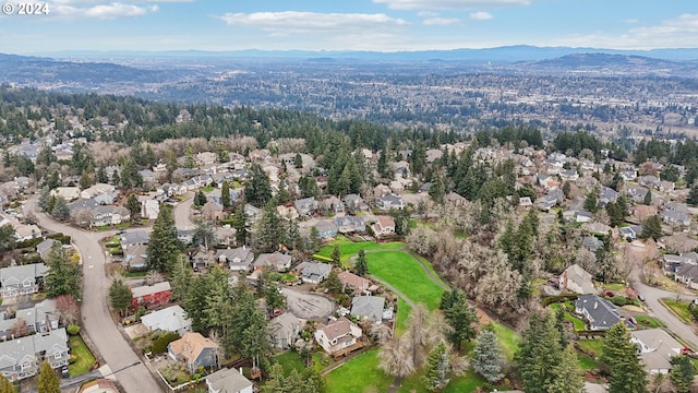 drone / aerial view featuring a mountain view