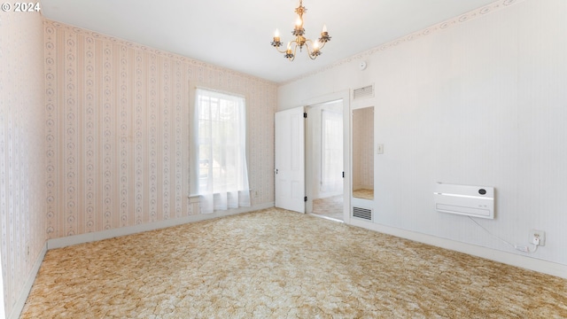 unfurnished bedroom with carpet flooring, visible vents, a chandelier, and wallpapered walls