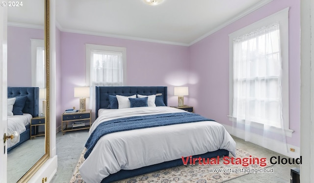 bedroom with carpet flooring, crown molding, and multiple windows