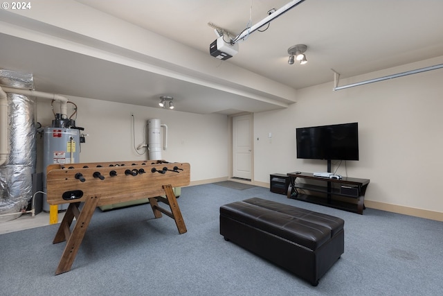 recreation room with carpet flooring and gas water heater