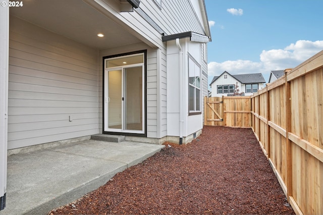 property entrance with a patio