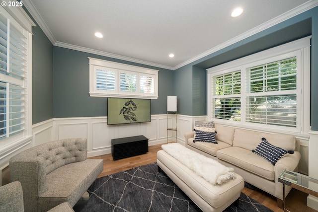 living room featuring dark hardwood / wood-style floors and ornamental molding