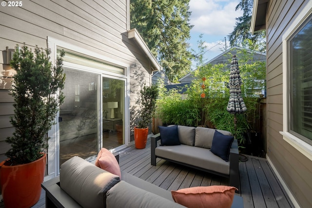 deck featuring outdoor lounge area