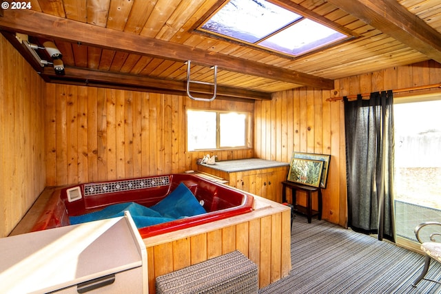 interior space with beamed ceiling and wood ceiling