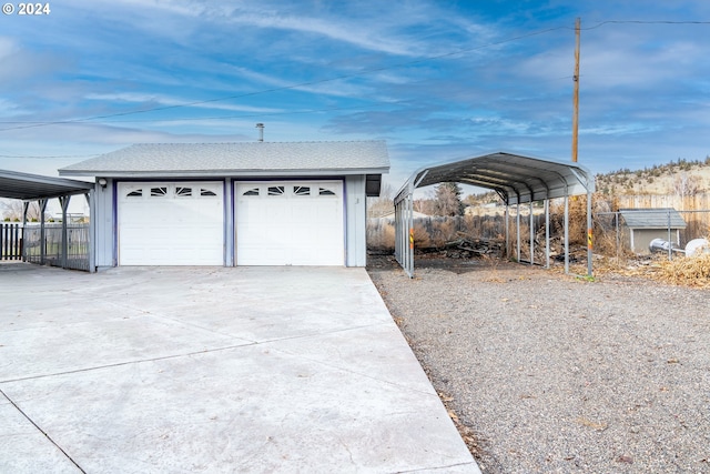 garage featuring a carport