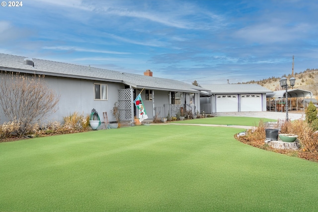 ranch-style home featuring a garage