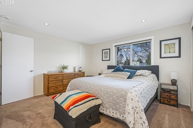 bedroom with recessed lighting and carpet flooring