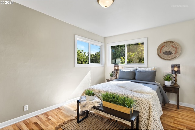 bedroom featuring hardwood / wood-style flooring