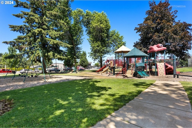 view of playground featuring a lawn