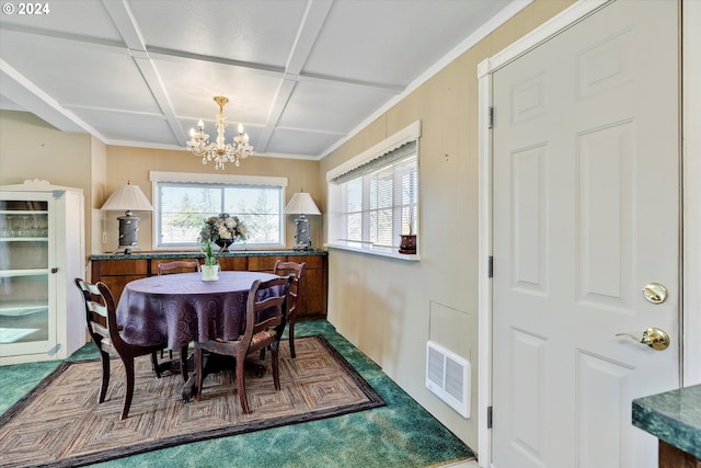 dining space with dark colored carpet, an inviting chandelier, and coffered ceiling