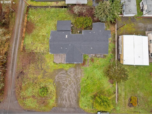 view of front facade with a front lawn and a garage