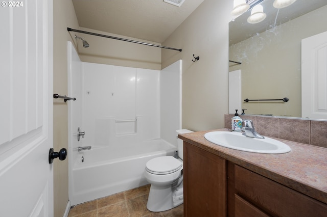 full bathroom featuring a textured ceiling, shower / bathing tub combination, toilet, tile patterned floors, and vanity