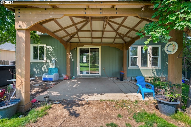 doorway to property with a patio