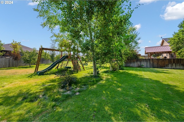 view of yard featuring a playground