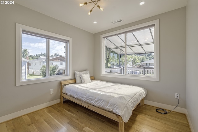 bedroom featuring light hardwood / wood-style floors