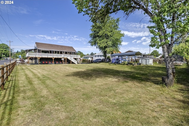 view of yard featuring a wooden deck