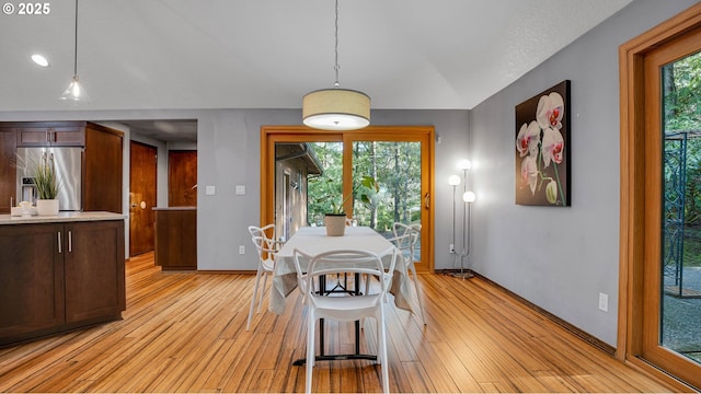 dining room with light wood-type flooring