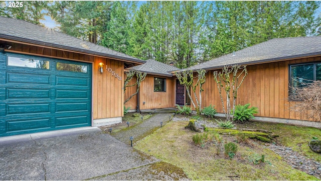 doorway to property featuring a garage