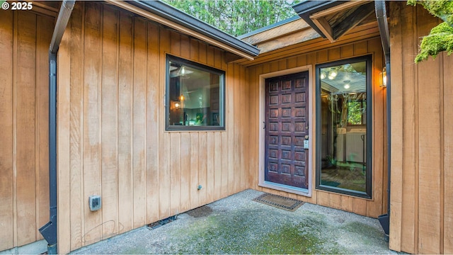 entrance to property with a patio area