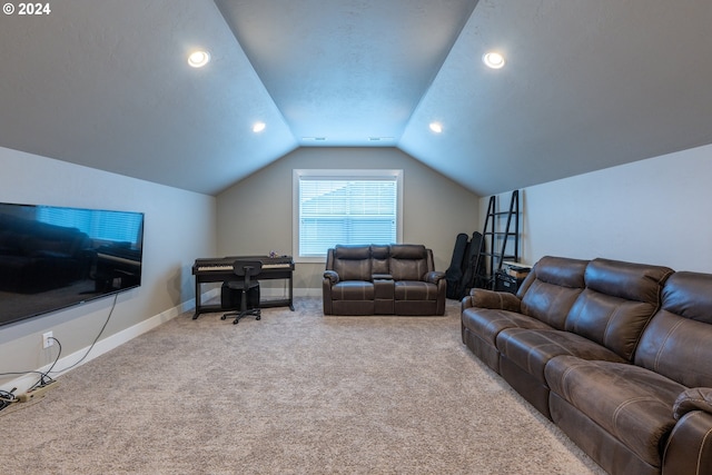 carpeted living room with lofted ceiling