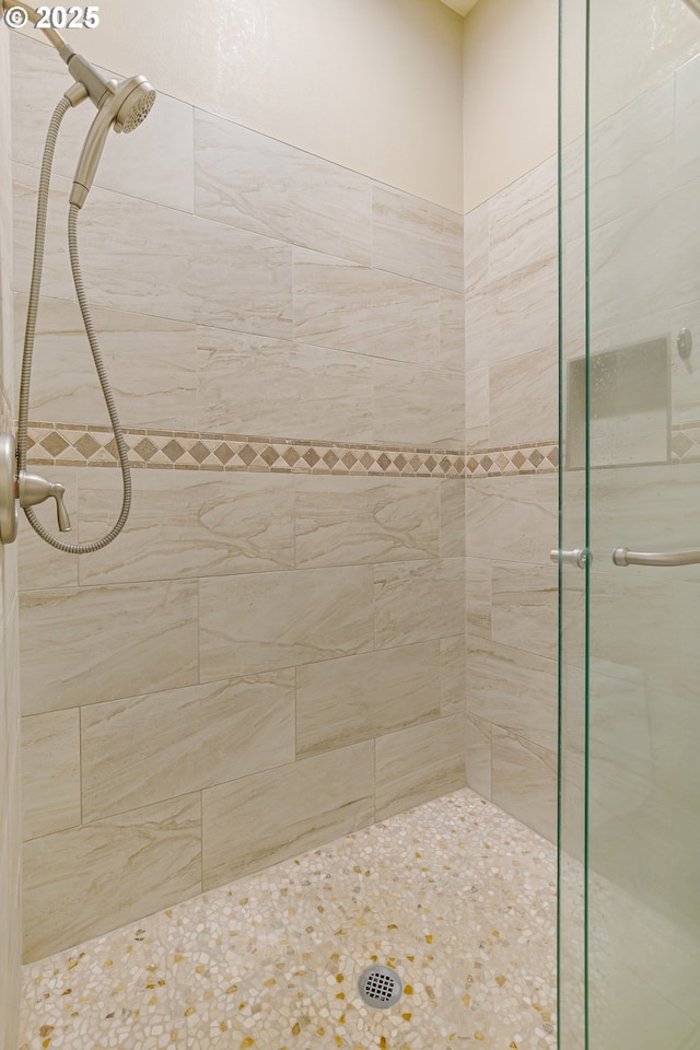 bathroom featuring a stall shower
