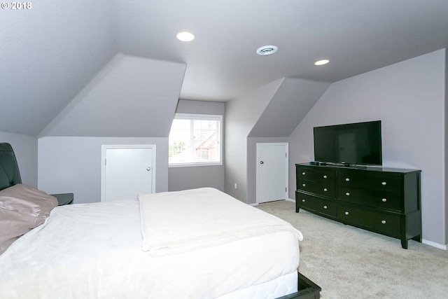 bedroom with vaulted ceiling, light carpet, recessed lighting, and baseboards