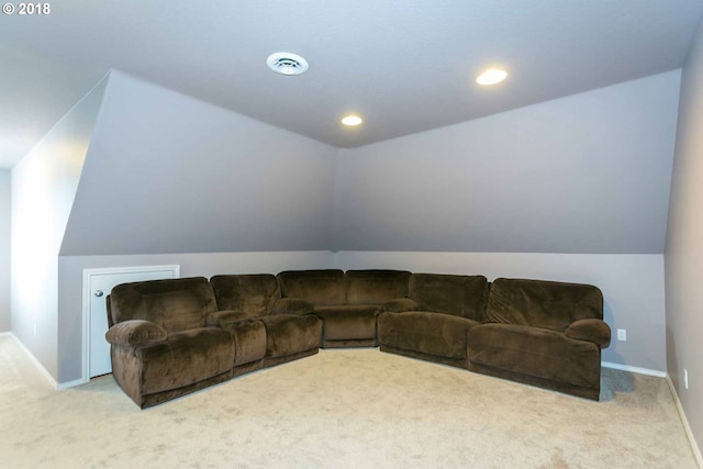 carpeted living room featuring lofted ceiling, baseboards, and recessed lighting