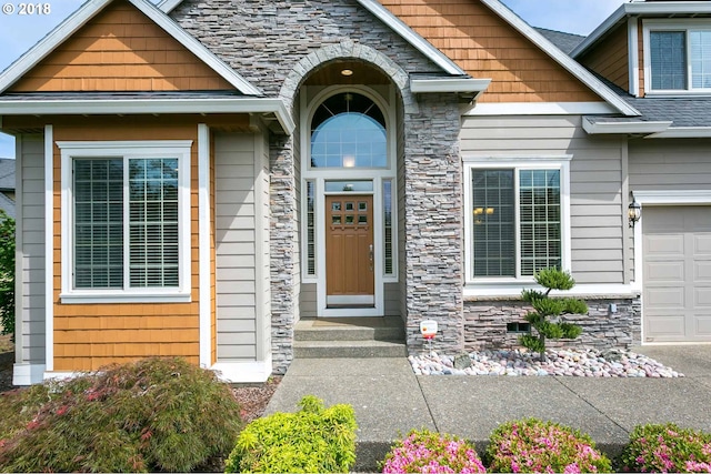 property entrance featuring stone siding