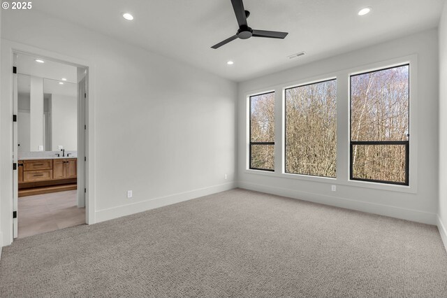 hall with sink and light hardwood / wood-style floors