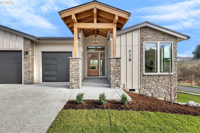 doorway to property with a garage