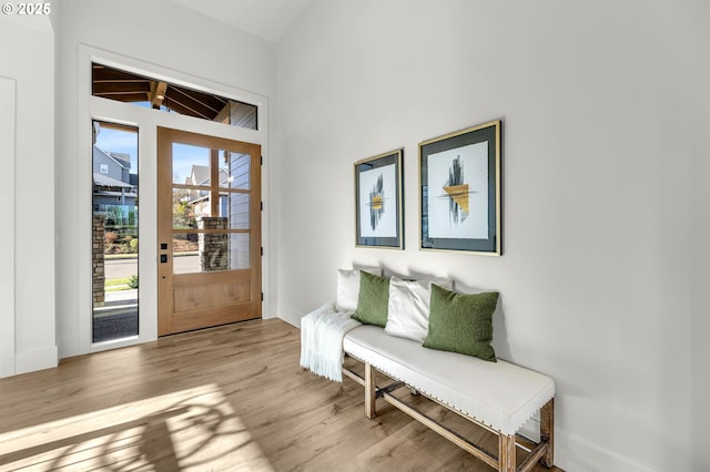 interior space with light wood-style flooring and baseboards