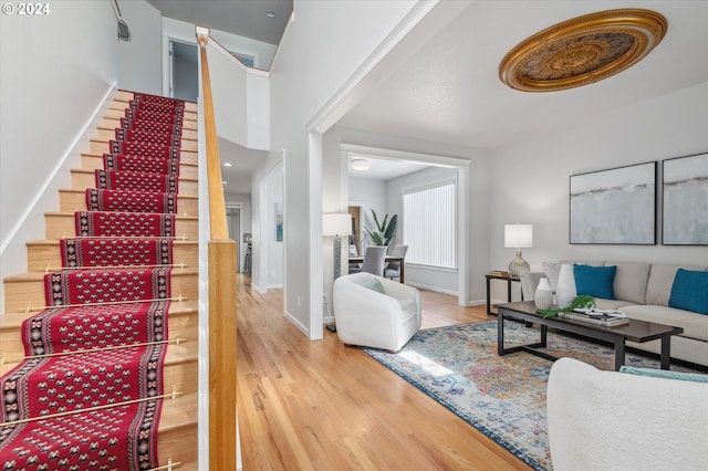 staircase featuring wood-type flooring