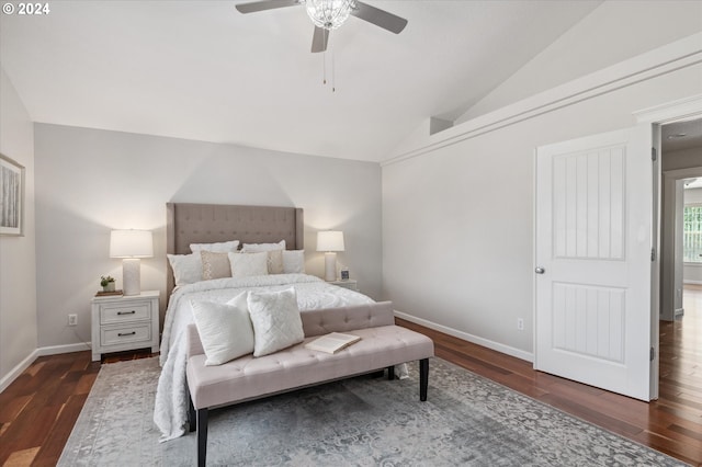 bedroom with vaulted ceiling, dark hardwood / wood-style floors, and ceiling fan