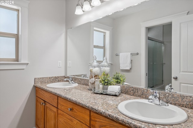 bathroom featuring vanity and walk in shower