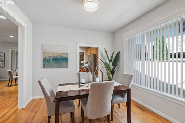 dining area featuring light hardwood / wood-style flooring