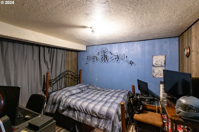 bedroom featuring a textured ceiling