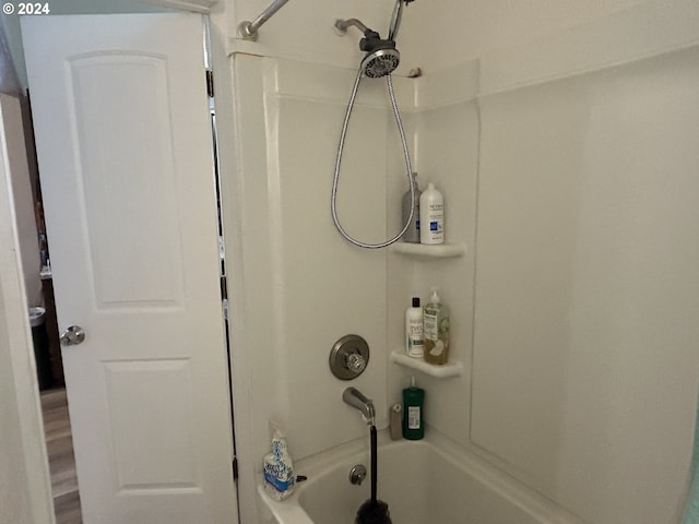 bathroom with shower / bathing tub combination