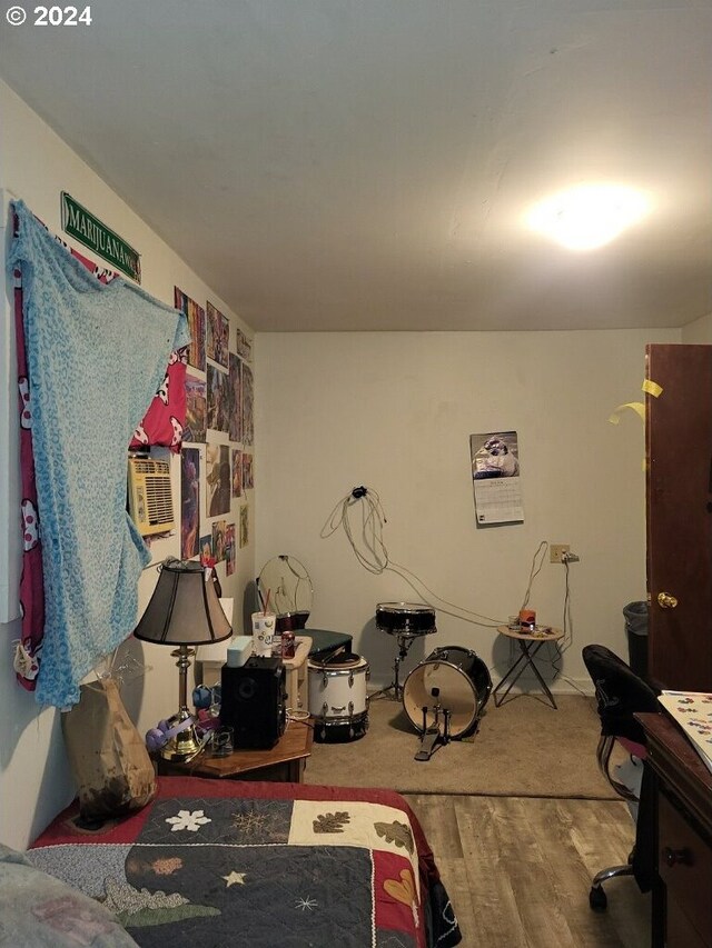 bedroom with wood-type flooring